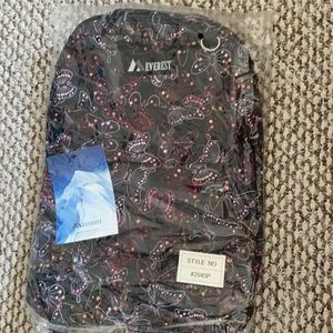 Black backpack with butterfly design
